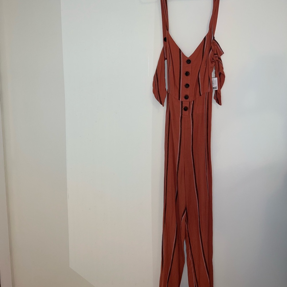 Stripped long jumper never been worn. Perfect for festivals or wine tasting.
